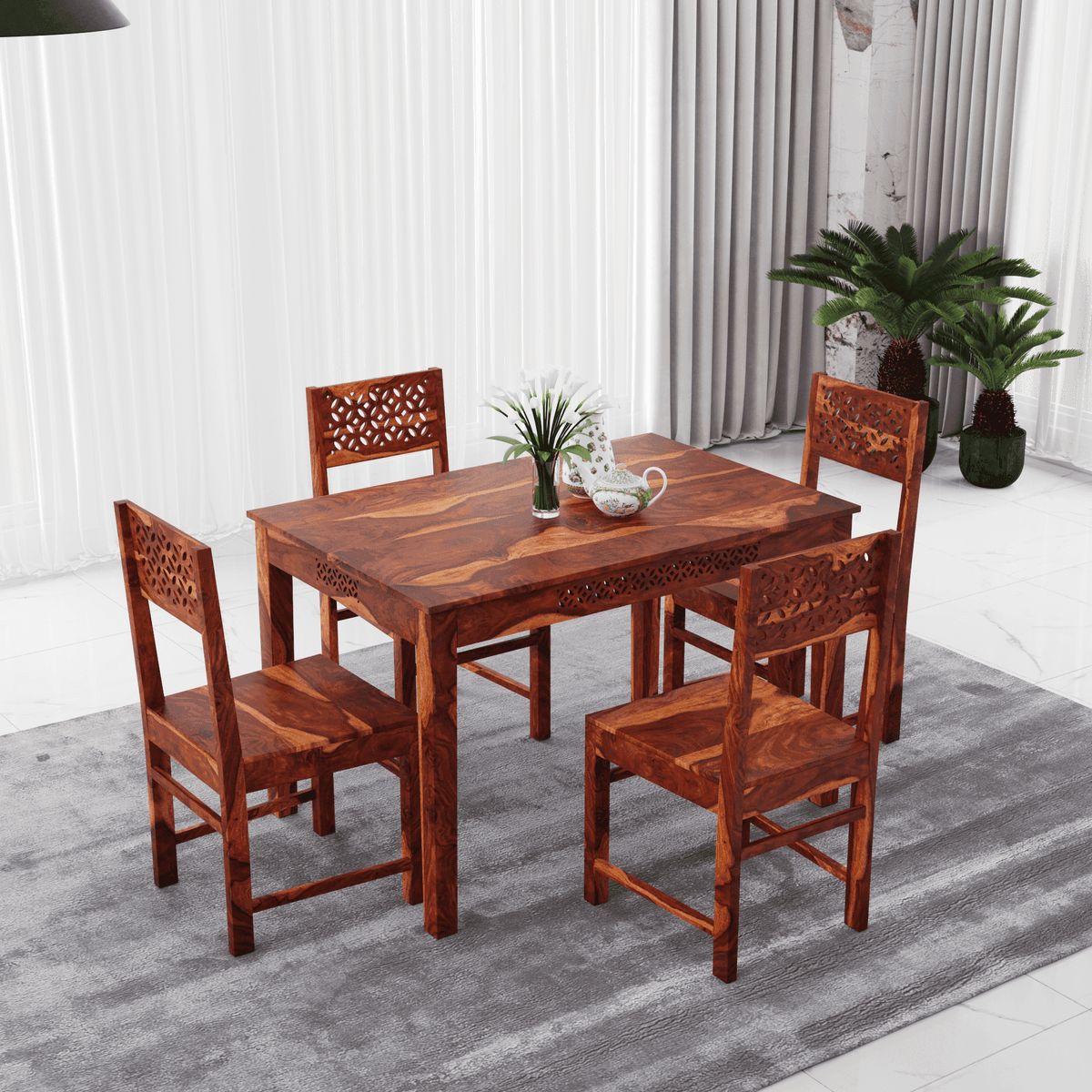 Wooden dining table set with four chairs upper view