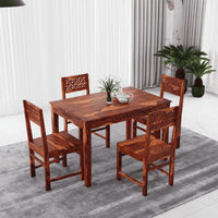 Wooden dining table set with four chairs upper view