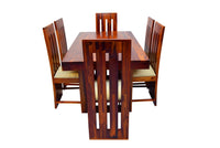 Wooden dining table set with four chairs on a white background