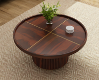 Round coffee table made of solid sheesham wood
