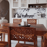 Dining area with wooden table and chairs in a kitchen setting