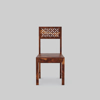 Wooden chair with intricate back design