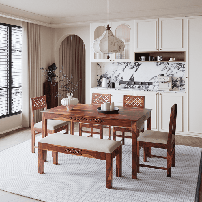 Dining room with wooden table, chairs, and bench in a modern home setting.