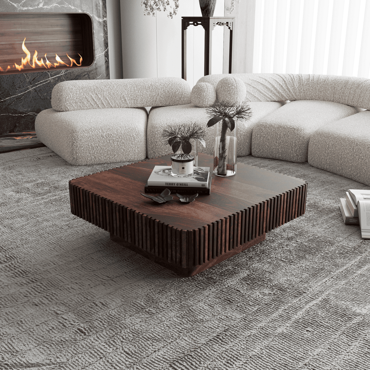 Modern living room with a sectional sofa, wooden coffee table, and fireplace.