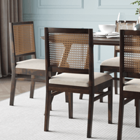 Dining room with wooden chairs and a table chair view