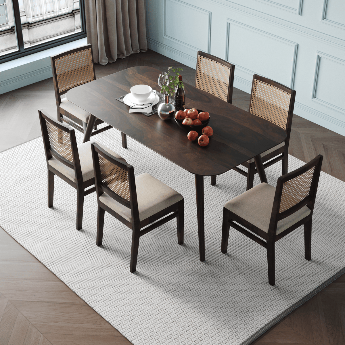Dining table set with six chairs in a room side upper view