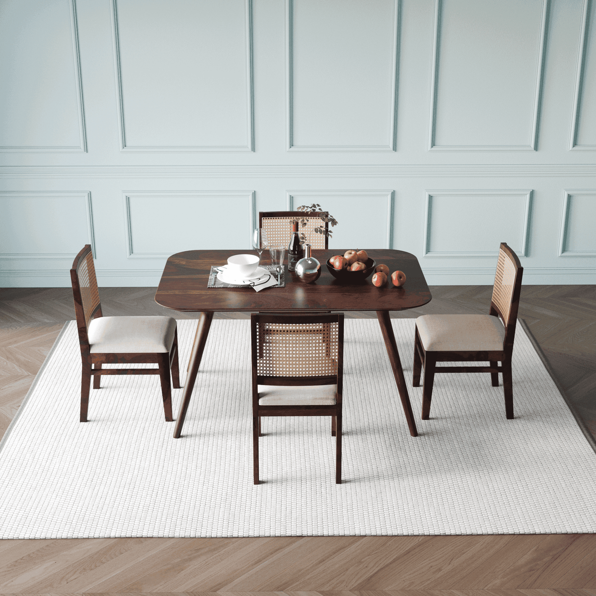 Dining table set with chairs in a room with side view
