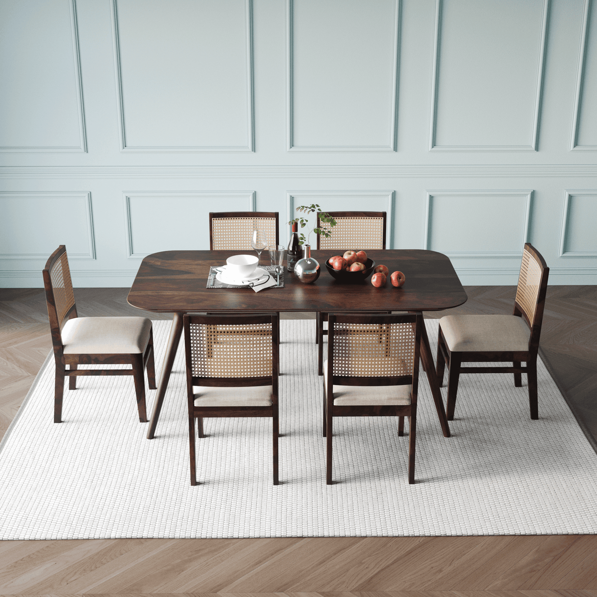 Dining table set with chairs in a room side upper view